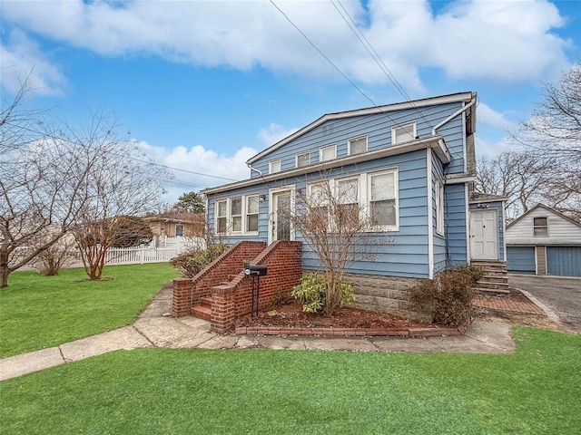 600 Little E Neck Rd, West Babylon, NY 11704 - view of front of property featuring an outdoor structure, entry steps, and a garage