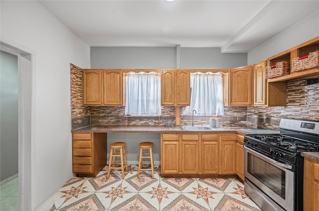 102-13 85th Ave, Richmond Hill, NY 11418 - kitchen with gas stove, a sink, and tasteful backsplash