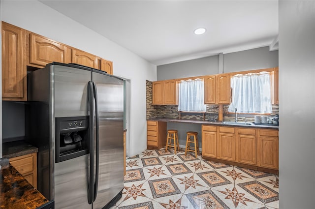 102-13 85th Ave, Richmond Hill, NY 11418 - kitchen featuring stainless steel fridge, a sink, tasteful backsplash, dark countertops, and recessed lighting