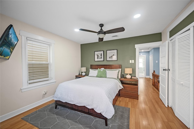 102-13 85th Ave, Richmond Hill, NY 11418 - bedroom featuring light wood-style flooring, a closet, baseboards, ceiling fan, and recessed lighting
