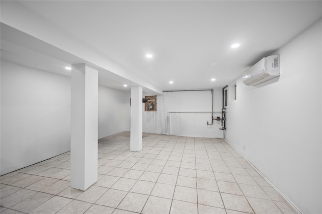 102-13 85th Ave, Richmond Hill, NY 11418 - finished basement featuring a wall mounted AC, recessed lighting, and light tile patterned floors