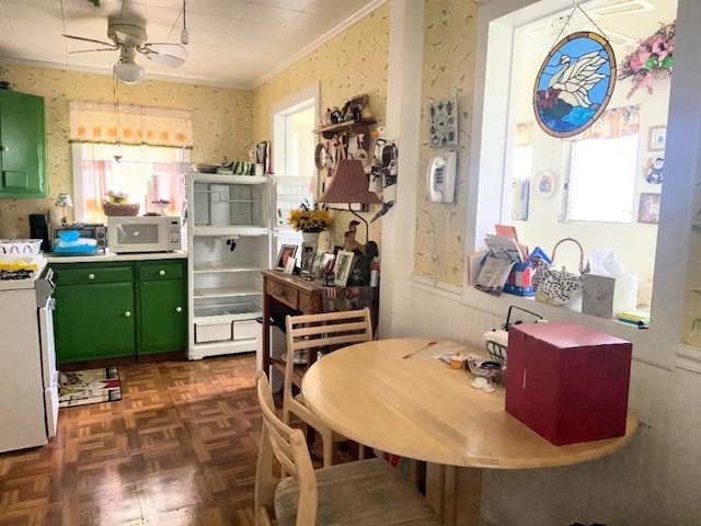 191 Sylvan Lake Rd Unit 5, Hopewell Junction, NY 12533 - dining space with a ceiling fan, crown molding, and wallpapered walls