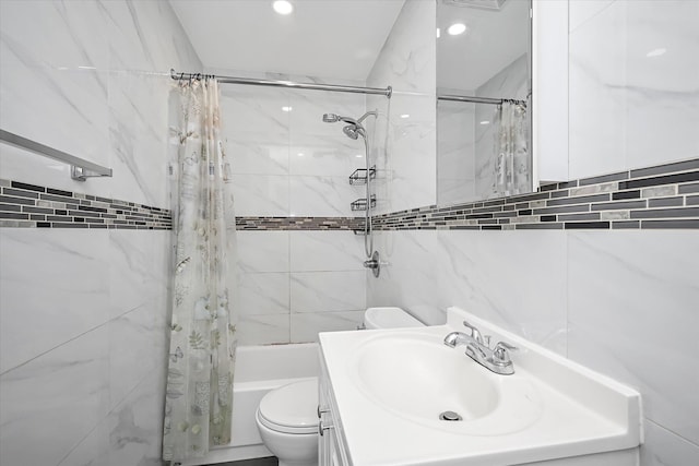 27-34 Mcintosh St, East Elmhurst, NY 11369 - bathroom featuring toilet, shower / tub combo, vanity, and tile walls