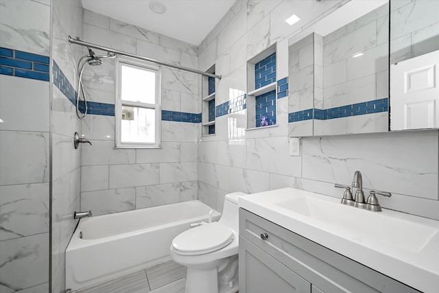 27-34 Mcintosh St, East Elmhurst, NY 11369 - bathroom with tile walls, shower / bathtub combination, toilet, and vanity