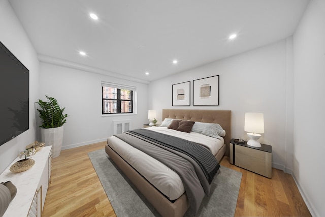 25-10 31st Ave Unit 2M, Astoria, NY 11106 - bedroom featuring light wood-style flooring, baseboards, and recessed lighting