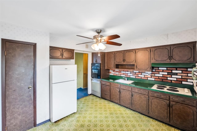 65 Cedar Ct, Copiague, NY 11726 - kitchen with white appliances, a sink, ceiling fan, light floors, and tasteful backsplash