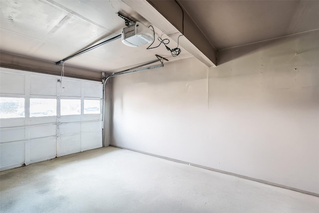 65 Cedar Ct, Copiague, NY 11726 - garage with a garage door opener