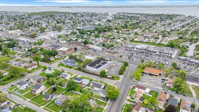 65 Cedar Ct, Copiague, NY 11726 - aerial view of property's location featuring a nearby body of water