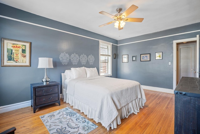 35-05 72nd St Unit 6F, Jackson Heights, NY 11372 - bedroom with baseboards, wood finished floors, and ceiling fan