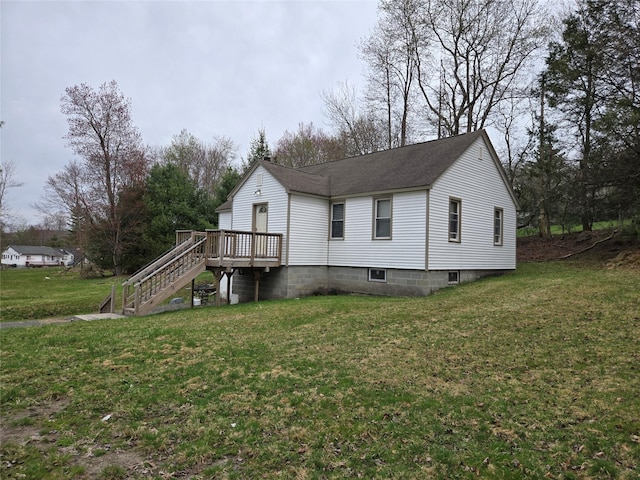 328 N Fraser, Kiamesha Lake, NY 12751 - view of home's exterior with stairway, a deck, a lawn, and a shingled roof