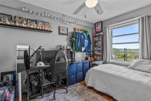 60 Locust Ave Unit 610, New Rochelle, NY 10801 - bedroom with wood finished floors and a ceiling fan