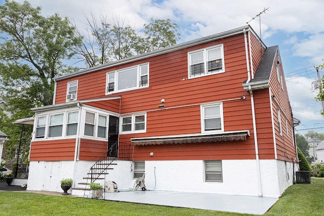 426 N High St, Mount Vernon, NY 10552 - rear view of property with a lawn and central AC