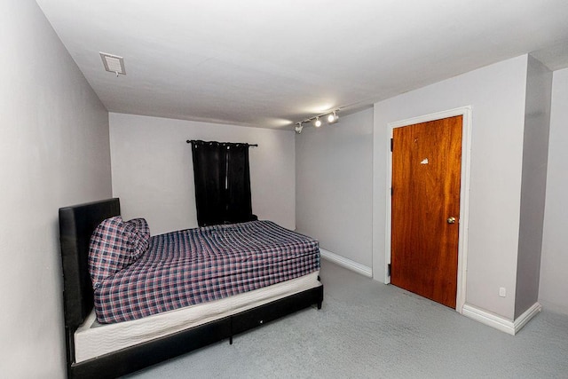 426 N High St, Mount Vernon, NY 10552 - bedroom with carpet, baseboards, and rail lighting