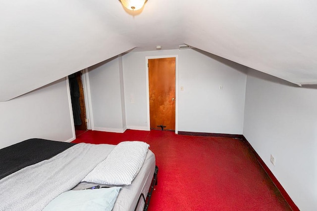 426 N High St, Mount Vernon, NY 10552 - carpeted bedroom featuring lofted ceiling and baseboards