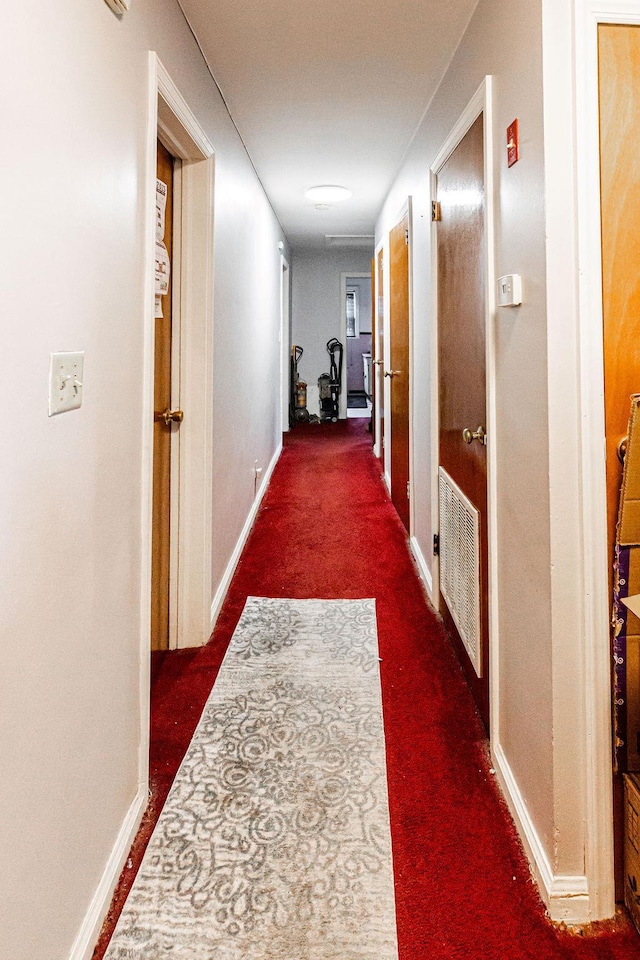 426 N High St, Mount Vernon, NY 10552 - hallway with dark colored carpet and baseboards