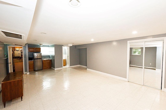 426 N High St, Mount Vernon, NY 10552 - unfurnished living room with baseboard heating, baseboards, and recessed lighting