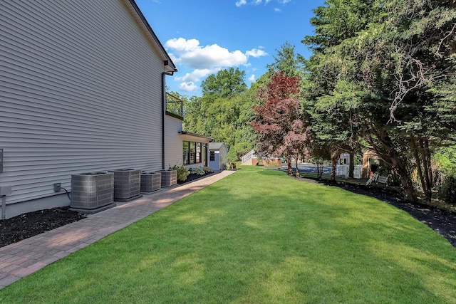 38 Cottontail Rd, Melville, NY 11747 - view of green lawn featuring central air condition unit