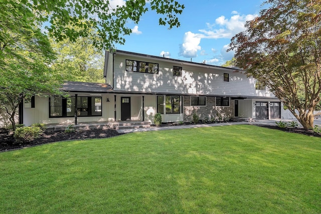 38 Cottontail Rd, Melville, NY 11747 - view of front facade with a front lawn