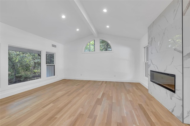 38 Cottontail Rd, Melville, NY 11747 - unfurnished living room with light wood-style floors, a premium fireplace, and recessed lighting