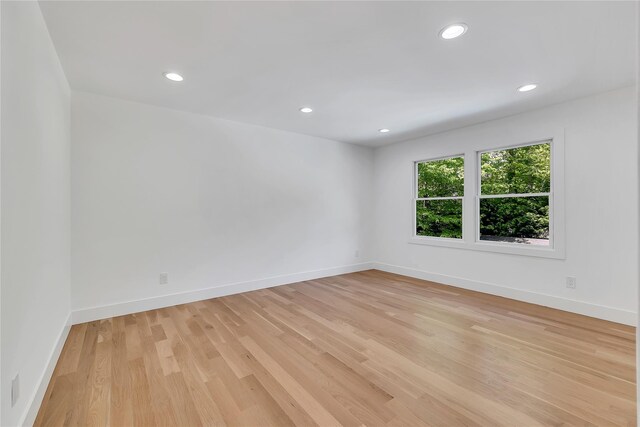38 Cottontail Rd, Melville, NY 11747 - spare room with light wood-style floors, baseboards, and recessed lighting