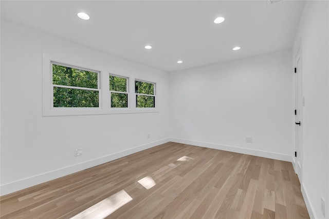 38 Cottontail Rd, Melville, NY 11747 - spare room featuring light wood-style floors, baseboards, and recessed lighting