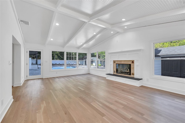 38 Cottontail Rd, Melville, NY 11747 - unfurnished living room featuring recessed lighting, light wood-style flooring, a glass covered fireplace, and baseboards
