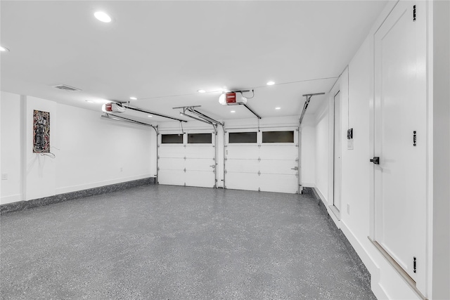 38 Cottontail Rd, Melville, NY 11747 - garage featuring a garage door opener, recessed lighting, and baseboards