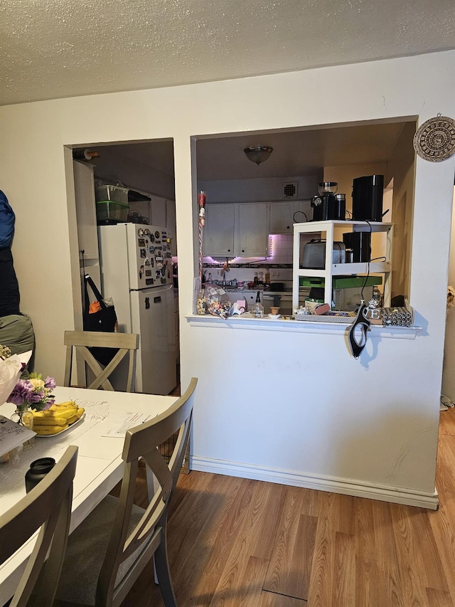 5824 Van Cleef St, Corona, NY 11368 - dining space with wood finished floors