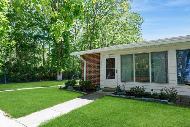 192 Ventry Ct Unit A, Ridge, NY 11961 - ranch-style home with a front yard