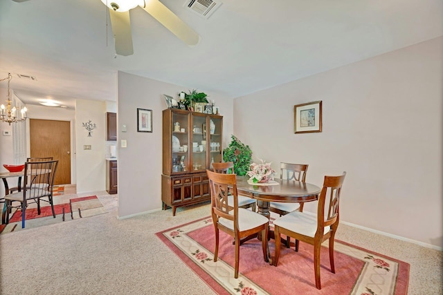 192 Ventry Ct Unit A, Ridge, NY 11961 - dining space featuring ceiling fan, baseboards, and a chandelier