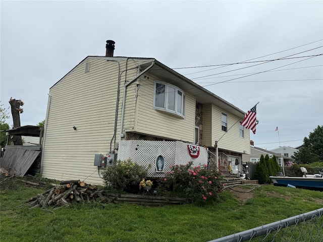 328 Brentwood Pkwy, Brentwood, NY 11717 - view of home's exterior with a yard