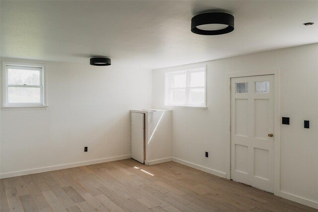 877 Shandelee Rd, Livingston Manor, NY 12758 - unfurnished room featuring light wood-style floors, healthy amount of natural light, and baseboards