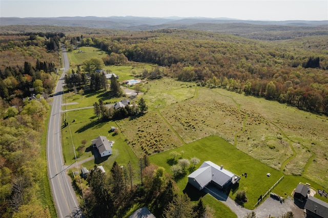 877 Shandelee Rd, Livingston Manor, NY 12758 - aerial view of property and surrounding area with a heavily wooded area and rural landscape