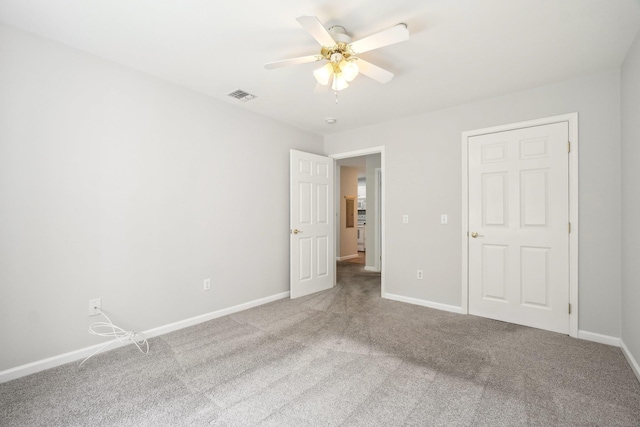 200 Woodcrest Ln Unit 202, Mount Kisco, NY 10549 - unfurnished bedroom featuring carpet floors, baseboards, and a ceiling fan