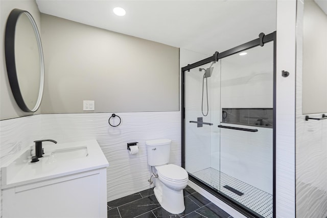 71 Cinnamon St, Central Islip, NY 11722 - bathroom featuring toilet, vanity, a shower stall, tile walls, and tile patterned flooring