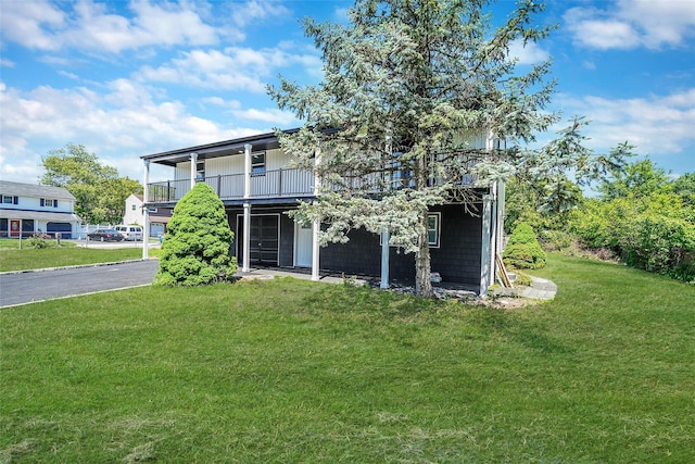 71 Cinnamon St, Central Islip, NY 11722 - view of front of property featuring a front lawn and driveway