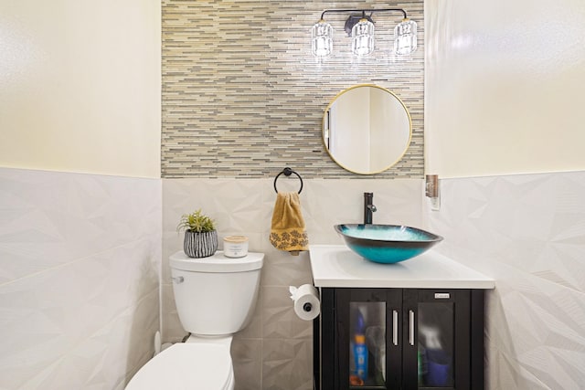 15 Arielle Ct, Hauppauge, NY 11749 - half bath featuring tile walls, toilet, and vanity