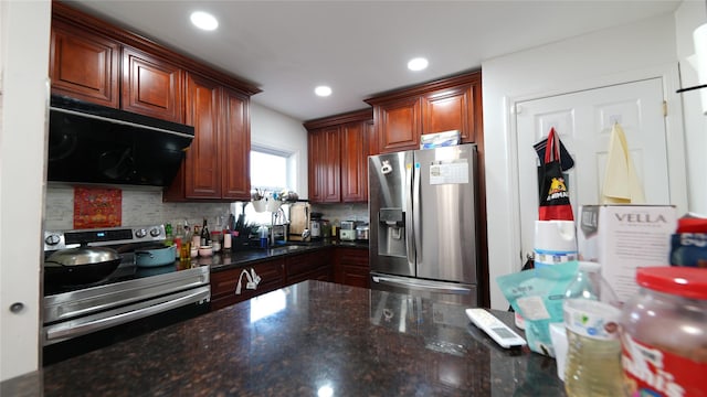 821 Virginia Ave, North Bellmore, NY 11710 - kitchen featuring appliances with stainless steel finishes, ventilation hood, backsplash, recessed lighting, and dark stone counters