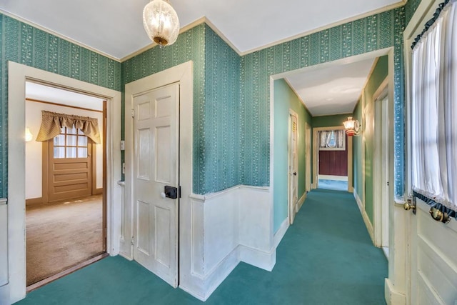 201 E Broadway Prt, Jefferson, NY 11777 - corridor featuring carpet, wallpapered walls, and ornamental molding
