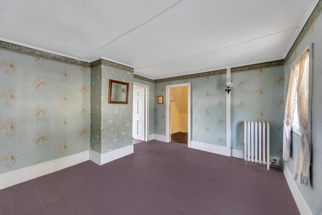 201 E Broadway Prt, Jefferson, NY 11777 - empty room with radiator heating unit, crown molding, and baseboards