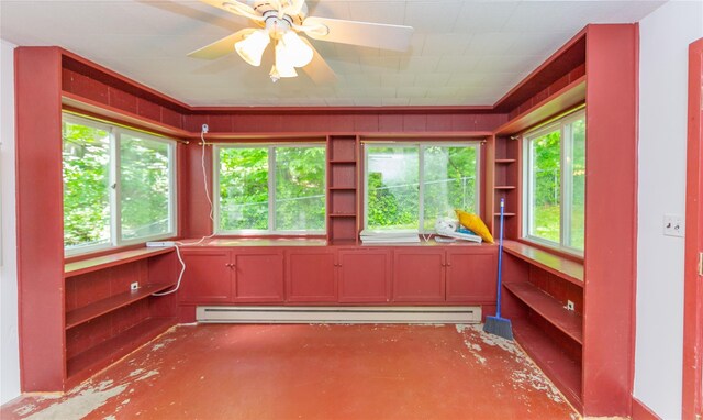 42 Harmony Rd, Pawling, NY 12564 - unfurnished sunroom featuring a baseboard radiator, concrete flooring, and healthy amount of natural light