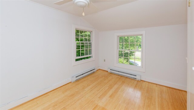 42 Harmony Rd, Pawling, NY 12564 - empty room with a baseboard radiator, wood finished floors, vaulted ceiling, ceiling fan, and baseboards