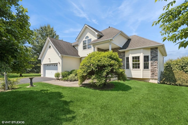 195 Old Castle Point Rd, Wappingers Falls, NY 12590 - view of front of house with a garage, a front yard, asphalt driveway, and stone siding