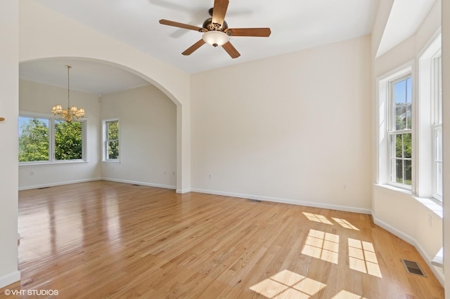 195 Old Castle Point Rd, Wappingers Falls, NY 12590 - unfurnished room with light wood-style floors, a chandelier, and baseboards
