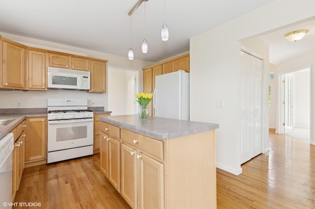 195 Old Castle Point Rd, Wappingers Falls, NY 12590 - kitchen with white appliances, light wood-style flooring, light brown cabinets, and a center island
