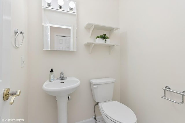 195 Old Castle Point Rd, Wappingers Falls, NY 12590 - half bathroom featuring toilet and baseboards