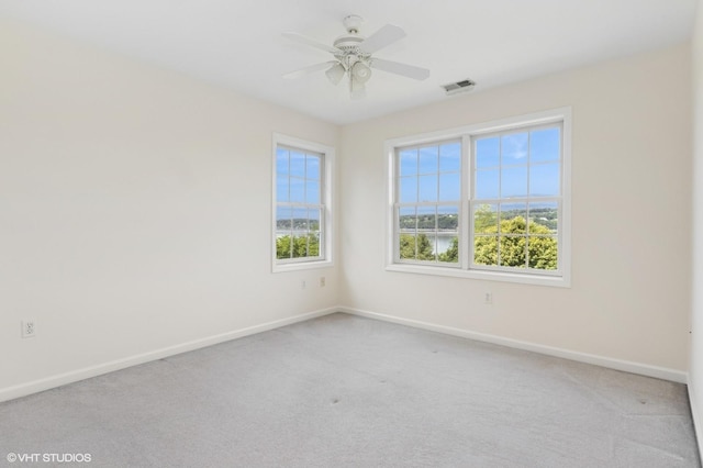 195 Old Castle Point Rd, Wappingers Falls, NY 12590 - unfurnished room with baseboards, carpet, and a ceiling fan