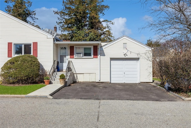 55 Nassau Ave, Glen Cove, NY 11542 - view of front of property featuring a chimney and driveway