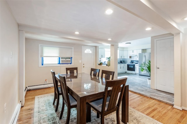 55 Nassau Ave, Glen Cove, NY 11542 - dining room with a baseboard radiator, light wood-type flooring, recessed lighting, baseboards, and cooling unit