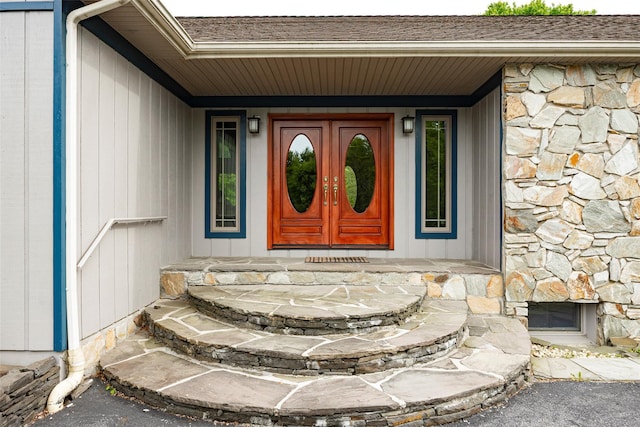 129 Clinton Corners Rd, Salt Point, NY 12578 - doorway to property featuring stone siding and roof with shingles